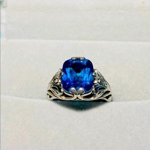 Beautiful etched design shank blue stone ring